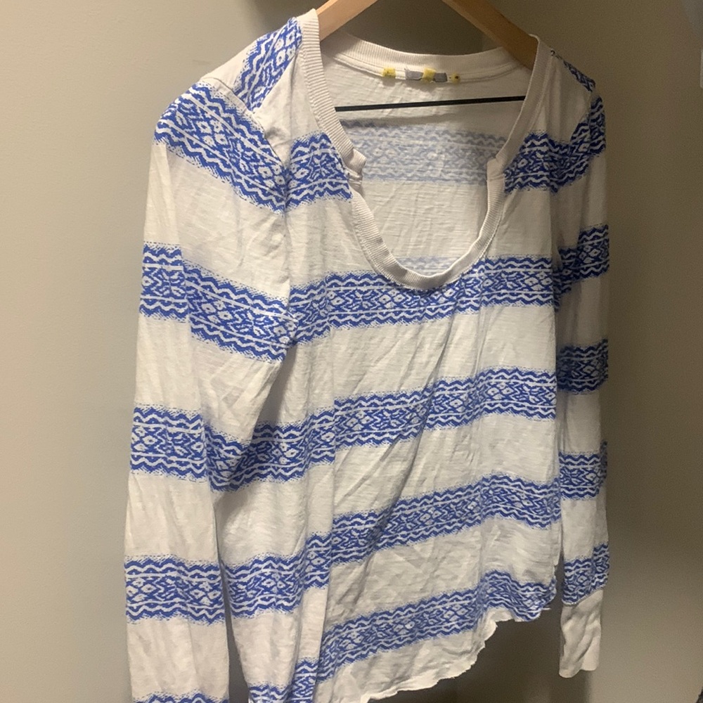 Long sleeved white and blue shirt